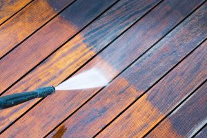 power washing a wooden patio deck